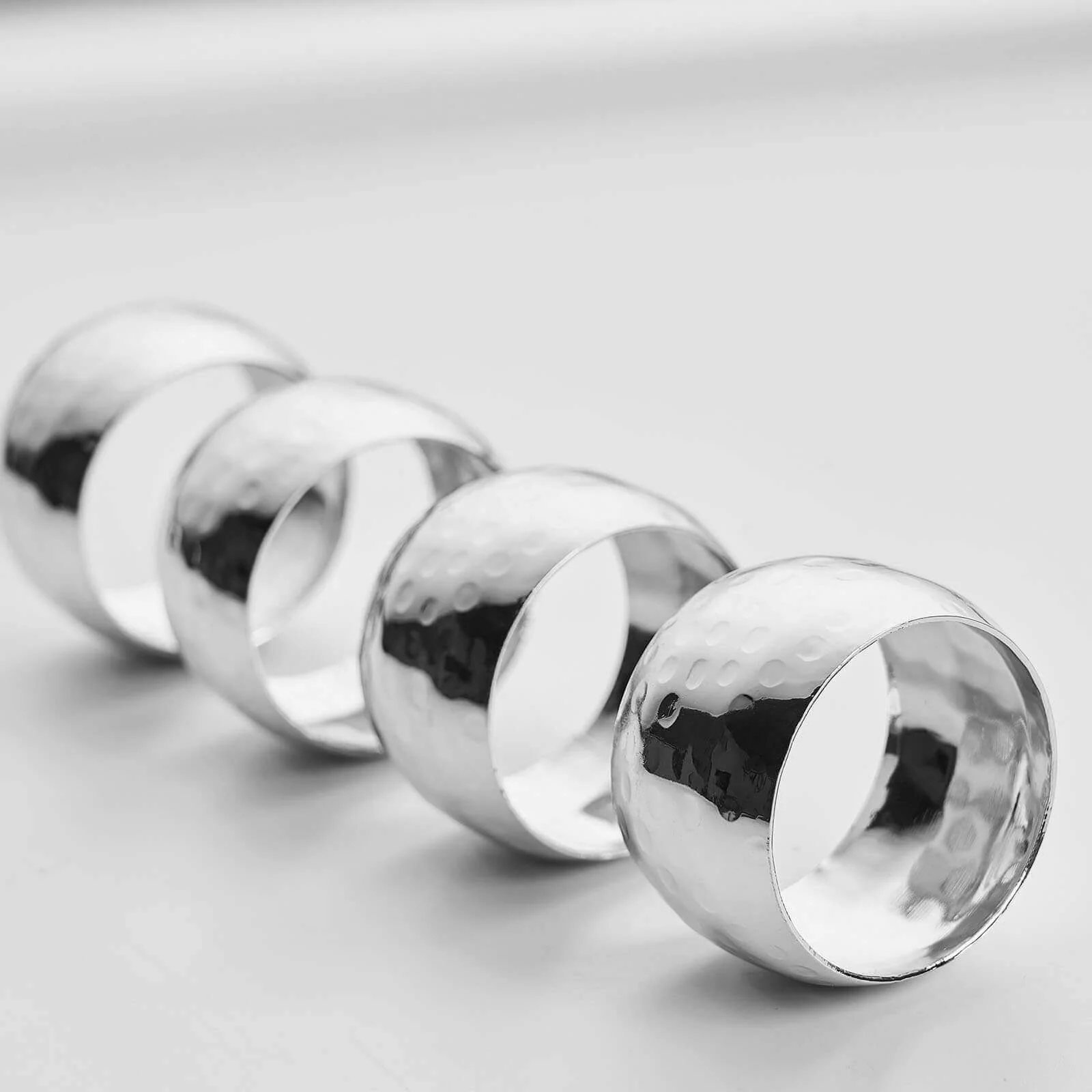 4 Pack Metallic Silver Hammered Pattern Metal Napkin Rings - Image 2