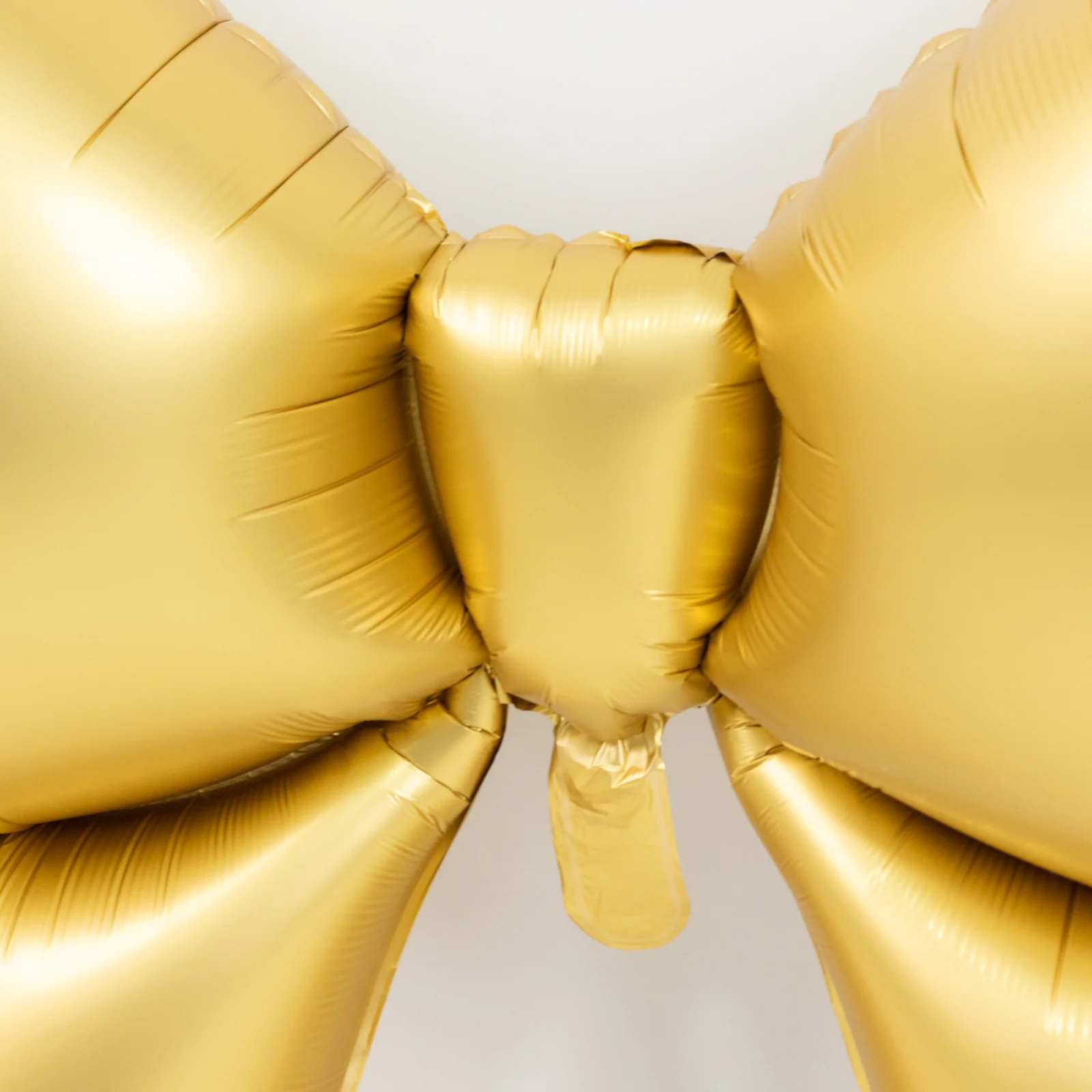 10 Pack Giant Foil Bow Balloons – Matte Gold Party Balloons for Backdrop, Photo Booth & Event Styling, 29″ x 27″ Inflated - Image 8